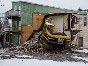 Crews tear down Price Street structure in Kingwood